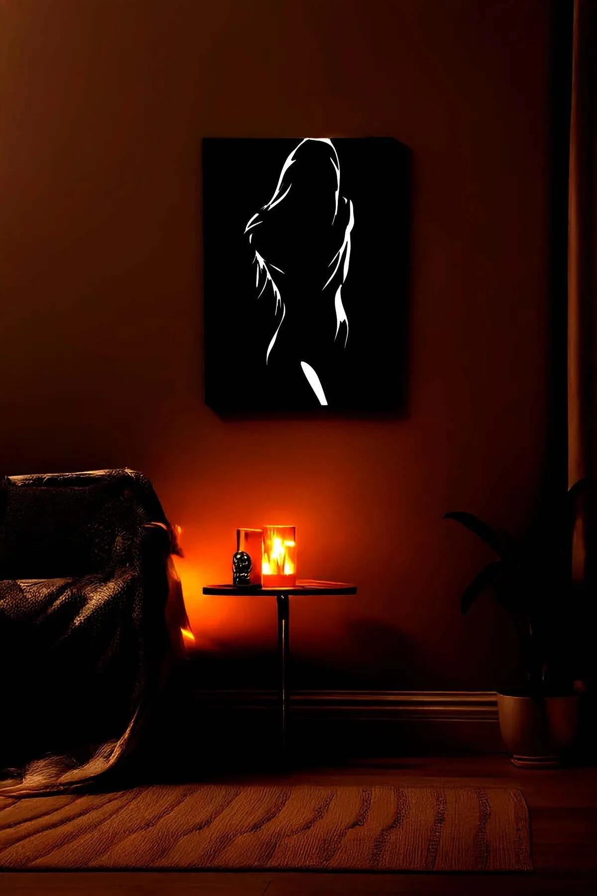 Reflective Female Silhouette Art on Black Canvas