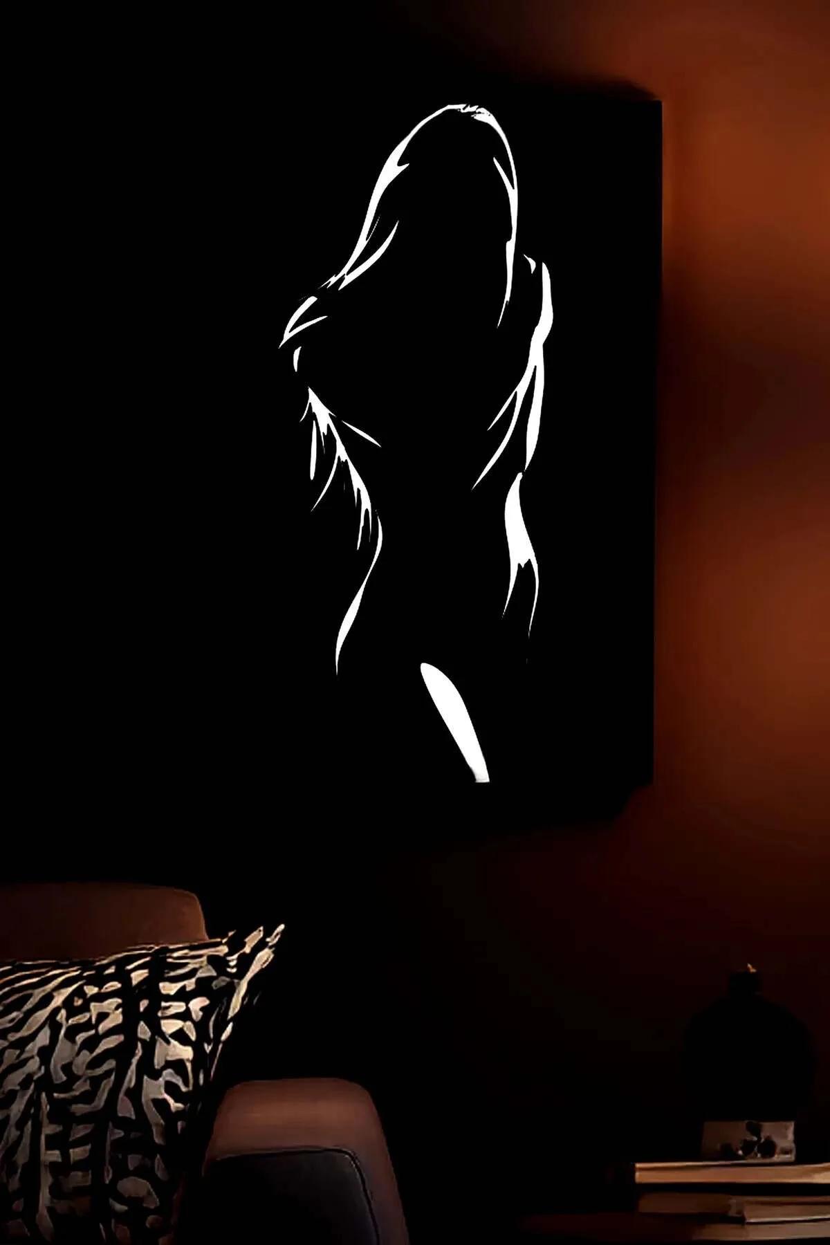 Reflective Female Silhouette Art on Black Canvas