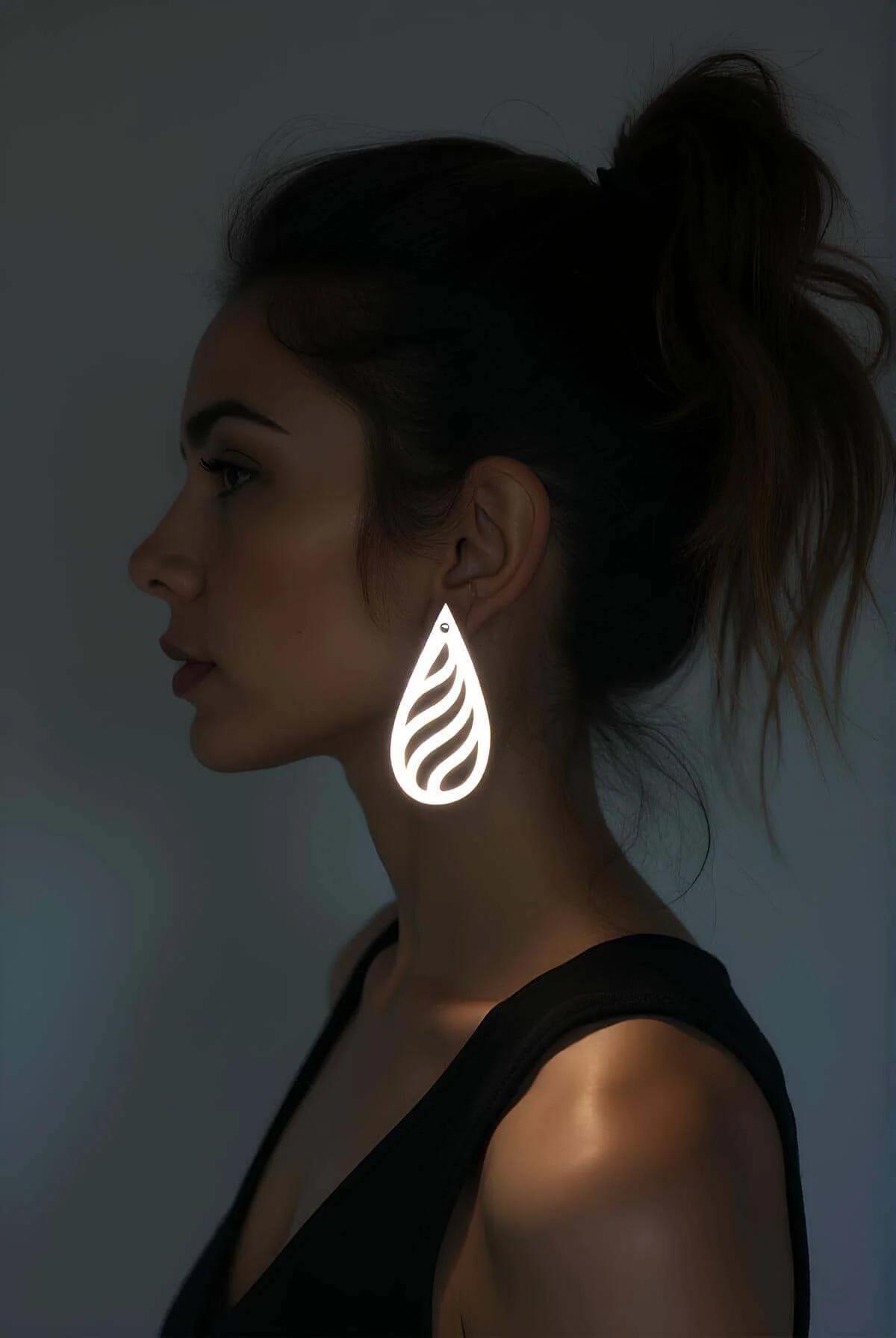 Reflective Teardrop Earrings with Laser-Cut Swirl Design